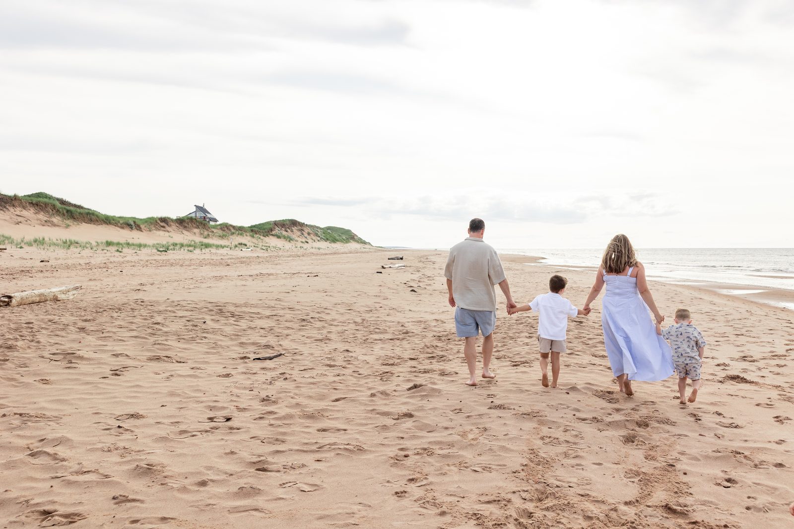 Lauren walking on the beach with her family